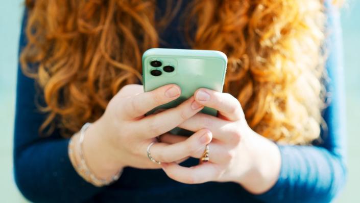 Woman using mobile phone