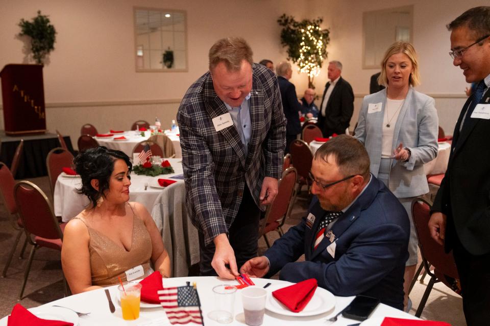 Mike Speedy a republican candidate running for congress in Indiana’s 6th Congressional District, talks with attendees of the Perry Township Lincoln Day dinner on Tuesday, April 2, 2024, at The Atrium in Indianapolis.