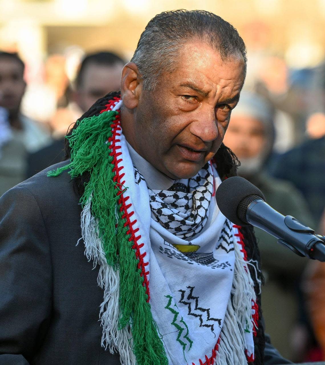 Yasir Amireh of the Palestine Freedom Project speaks during a City of Fresno-sponsored Palestinian flag-raising ceremony to show support for the Palestinian community as war rages on in the Middle East, in Eaton Plaza on Friday, Dec. 8, 2023.