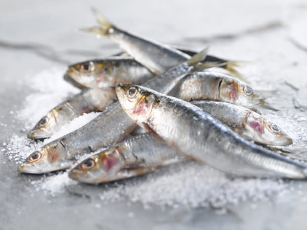 <p>Sardines are a top source of marine-based omega-3 fatty acids, a special polyunsaturated fat shown to benefit the heart. Omega-3s also lower triglycerides (the fat in your blood) and slow formation of arterial plaque. </p><p>You can eat them straight, in lemon-flavored olive oil, or with tomato sauce on seeded crackers. Or if you can’t stomach the idea of sardines, other good bets include albacore tuna, <a href="http://www.michelledudash.com/2013/01/21/basil-balsamic-salmon-salad/" rel="nofollow noopener" target="_blank" data-ylk="slk:wild salmon;elm:context_link;itc:0;sec:content-canvas" class="link ">wild salmon</a>, and trout. </p><p>The USDA Dietary Guidelines recommend eight ounces of seafood per week, the amount associated with reduced cardiac deaths.</p>