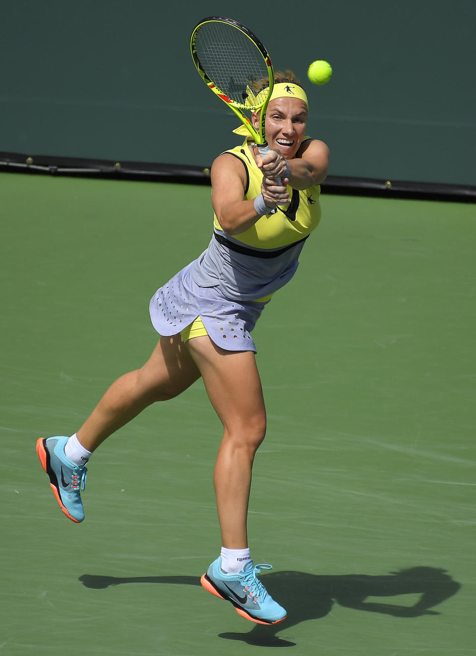 Svetlana Kuznetsova, of Russia, returns a shot to Anastasia Pavlyuchenkova, of Russia, at the BNP Paribas Open tennis tournament, Wednesday, March 15, 2017, in Indian Wells, Calif. (AP Photo/Mark J. Terrill)