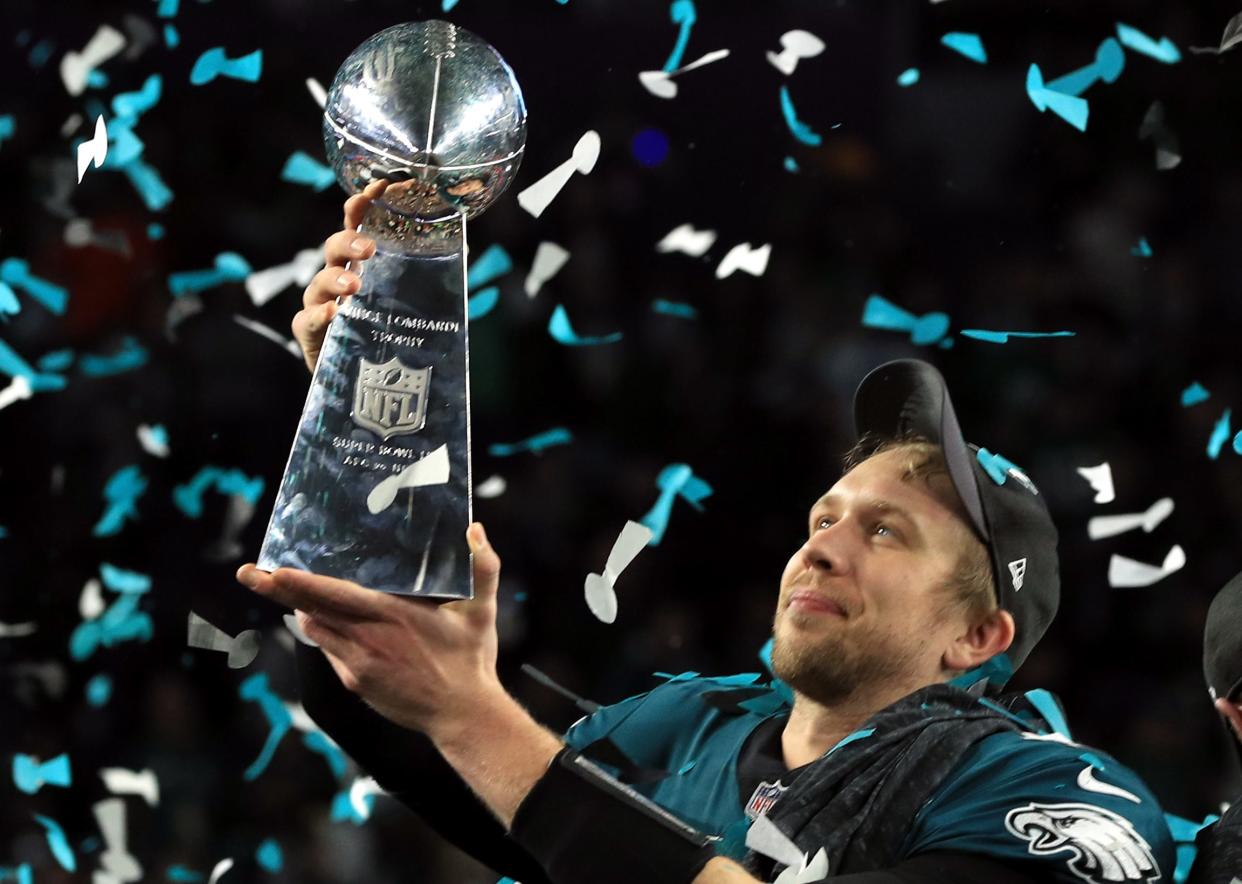 MINNEAPOLIS, MN - FEBRUARY 04:  Nick Foles #9 of the Philadelphia Eagles celebrates with the Lombardi Trophy after defeating the New England Patriots 41-33 in Super Bowl LII at U.S. Bank Stadium on February 4, 2018 in Minneapolis, Minnesota.  (Photo by Mike Ehrmann/Getty Images)