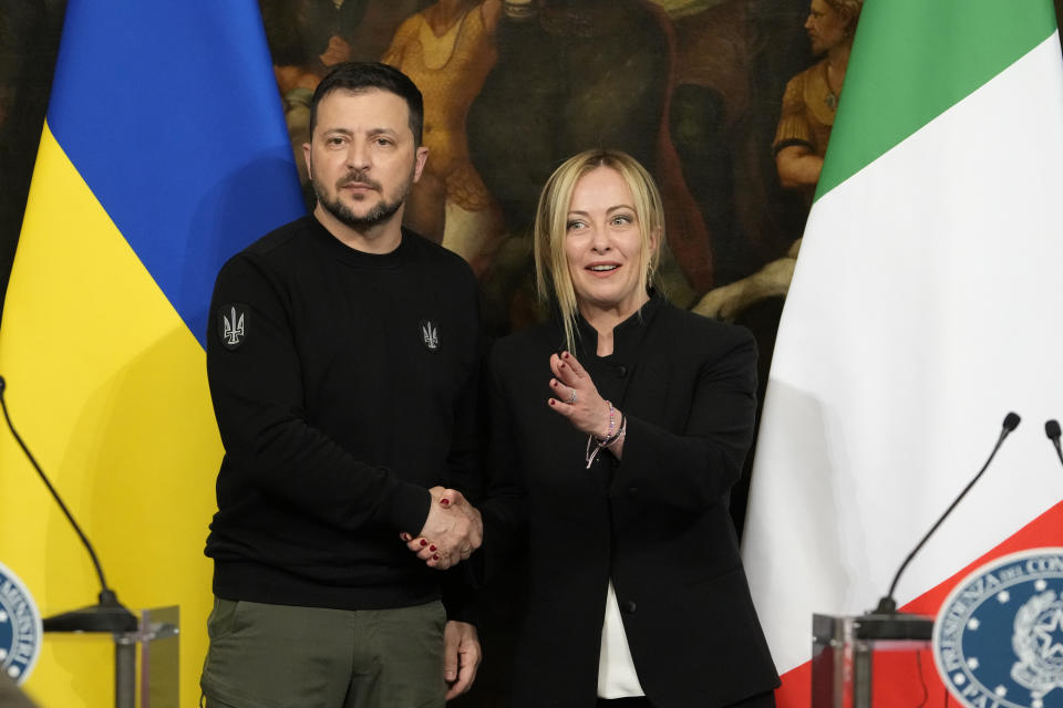 FILE - Ukrainian President Volodymyr Zelenskyy, left, and Italian Premier Giorgia Meloni shake hands during a press conference after their meeting at Chigi Palace, Government's office, in Rome, Saturday, May 13, 2023. While the world awaits Ukraine's spring offensive, its leader Volodymyr Zelenskyy has already launched a diplomatic one. In a span of a week, he has dashed to Italy, the Vatican, Germany, France and Britain to shore up support for the defense of his country. On Friday, May 19, 2023, he was in Saudi Arabia to meet with Arab leaders, some of whom are allies with Moscow. (AP Photo/Alessandra Tarantino, File)