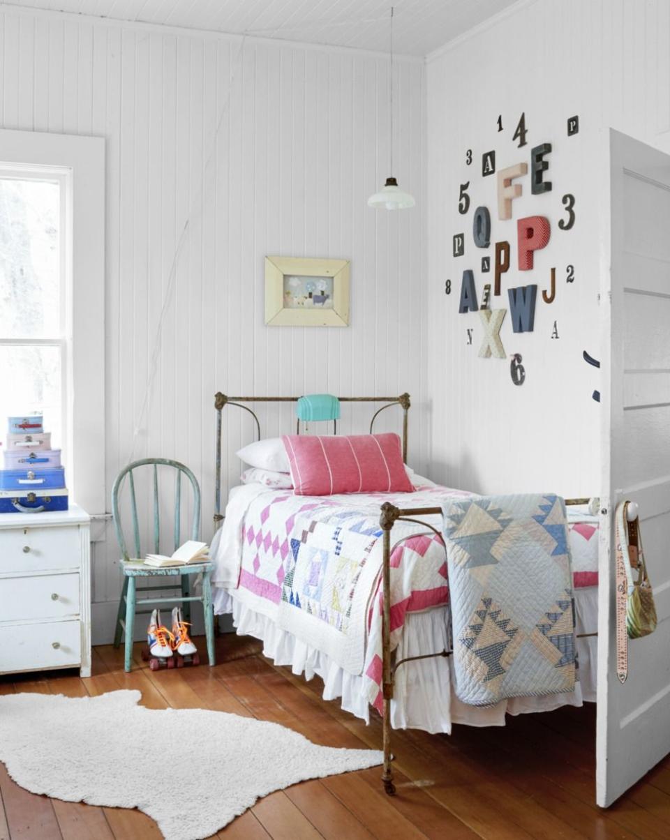 Collection of Letters and Numbers Above the Bed