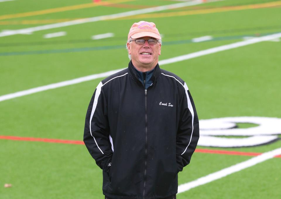 Mamaroneck field hockey coach John Savage is retiring after 26 years on the field. Coach Savage was photographed at Mamaroneck High School on Wednesday, May 4, 2022.