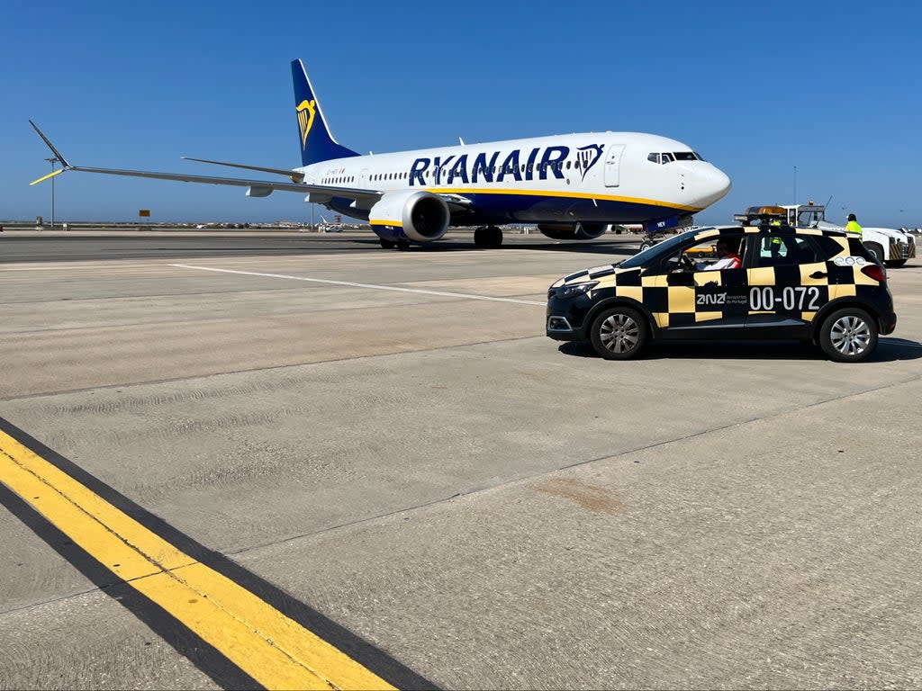 Blue is the colour: Ryanair Boeing 737 Max at Faro airport in Portugal, one of the routes chosen by Rangers fans heading for the Europa League final (Simon Calder)