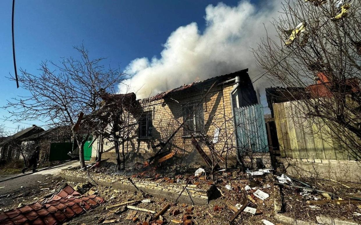 A burning house in Kherson