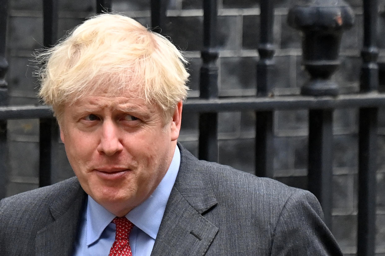 Britain's Prime Minister Boris Johnson leaves 10 Downing Street in central London on September 22, 2020 to make make a statement to MPs in Parliament on the COVID-19 pandemic. - The British government will announce fresh steps Tuesday to try and stop a coronavirus surge in England, while the United States was on the verge of 200,000 Covid-19 deaths. The pandemic is showing no signs of slowing down -- more than 31.2 million infections have been detected worldwide, with 964,000 deaths -- and nations are scrambling to contain new outbreaks. (Photo by JUSTIN TALLIS / AFP) (Photo by JUSTIN TALLIS/AFP via Getty Images)