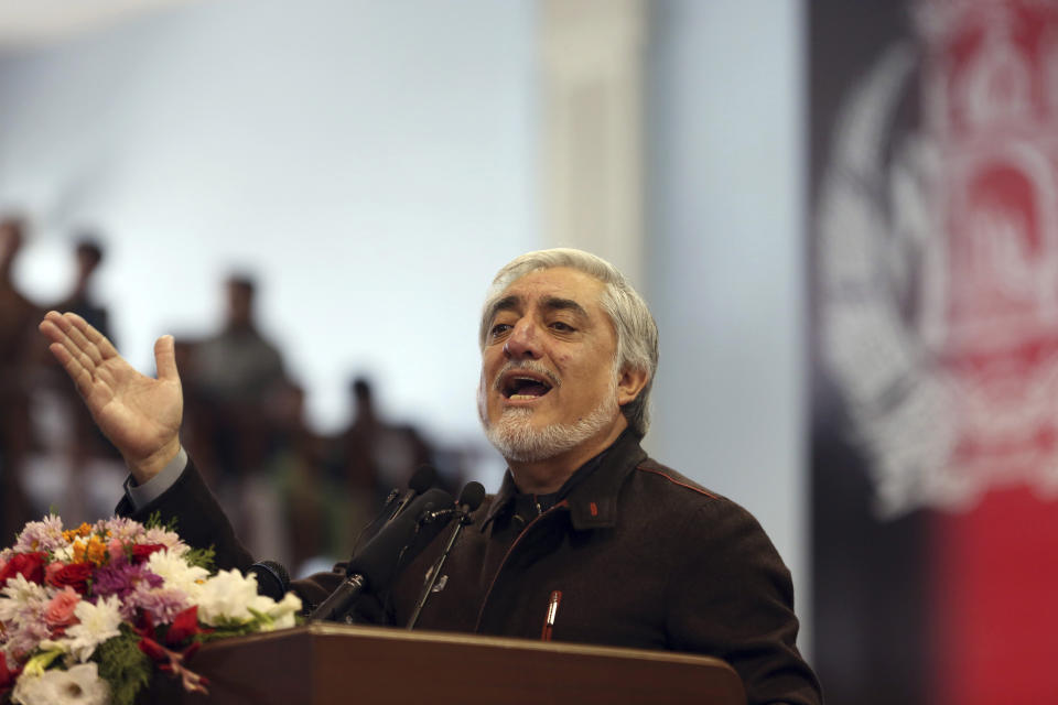 Afghan presidential candidate Abdullah Abdullah speaks to his supporters at a gathering in Kabul, Afghanistan, Sunday, Nov. 10, 2019. Abdullah has unilaterally withdrawn his team's election observers from an official recount of ballots ahead of long-delayed election results. (AP Photo/Rahmat Gul)