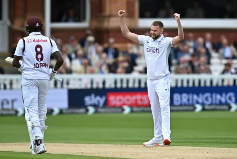 England's Gus Atkinson (R) celebrates after the dismissal of West Indies' Alzarri Joseph (Paul ELLIS)