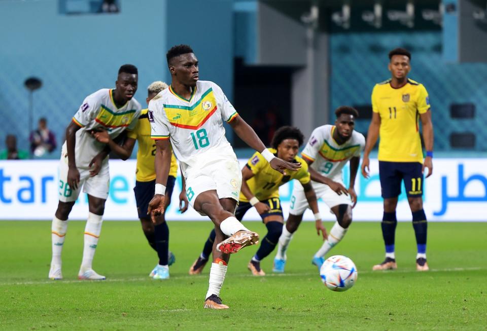 DOHA, QATAR - NOVEMBER 29: Ismaila Sarr of Senegal scores their team’s first goal off a penalty during the FIFA World Cup Qatar 2022 Group A match between Ecuador and Senegal at Khalifa International Stadium on November 29, 2022 in Doha, Qatar. (Photo by Buda Mendes/Getty Images)