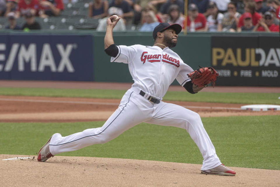 Cleveland Guardians starting pitcher Xzavion Curry delivers against the Chicago White Sox during the first inning of a baseball game in Cleveland, Sunday, Aug. 6, 2023. (AP Photo/Phil Long)