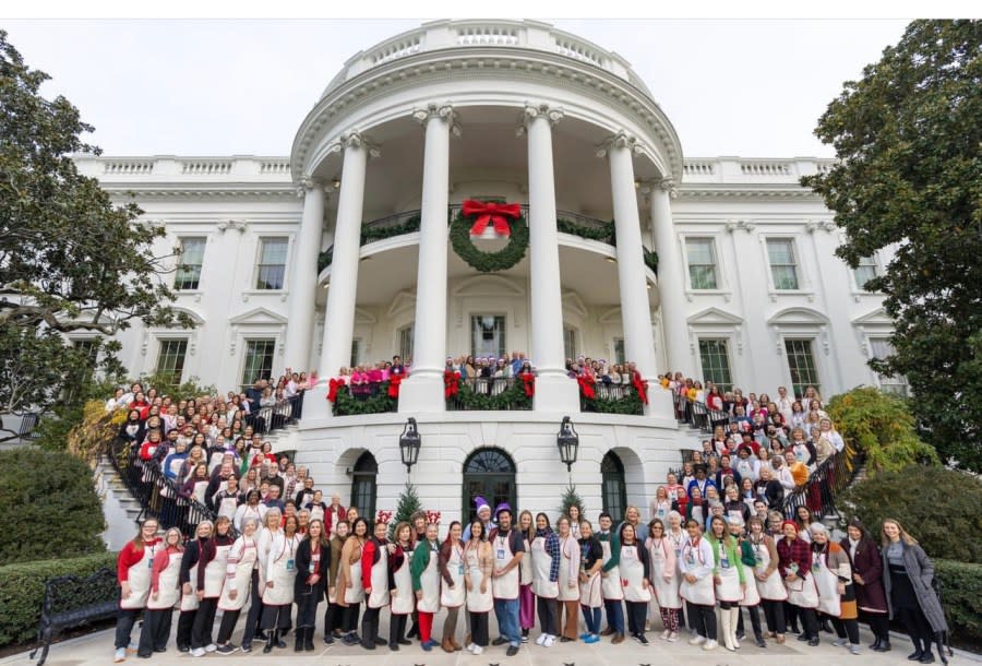 Volunteers from across the country stand on the White House steps. The volunteers were called to help decorate the White House for the holidays. (Courtesy: Utah Valley University)
