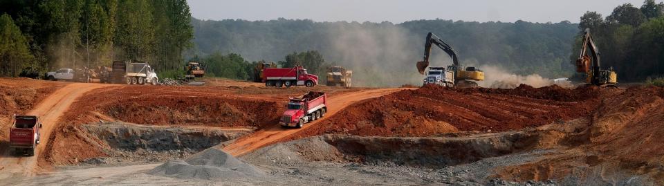 Road construction crews remove dirt at the site of the McWright’s Ferry Rd. Extension near where it will join the Eastern Northern Bypass at Rice Mine Rd. In Tuscaloosa Tuesday, Sept. 12, 2023.