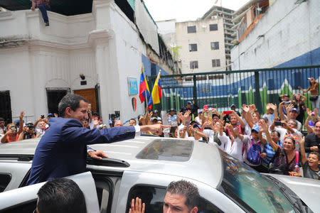 Venezuelan opposition leader Juan Guaido, who many nations have recognised as the country's rightful interim ruler, takes part in a gathering with supporters in Caracas, Venezuela, April 19, 2019. REUTERS/Manaure Quintero