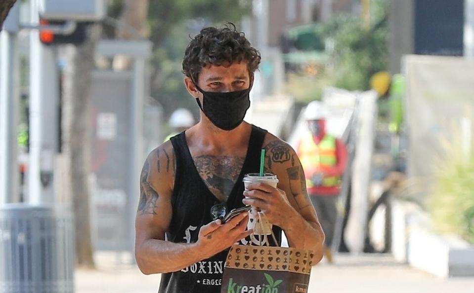 <h1 class="title"><em>EXCLUSIVE</em> Shia LaBeouf shows off his muscles as he grabs breakfast to go</h1><cite class="credit">Backgrid Images</cite>