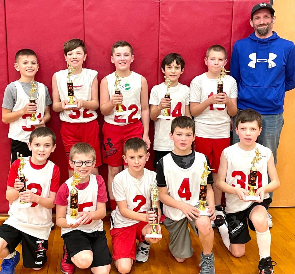 Meet this year's Honesdale Biddy Basketball Association Junior Division champions. Under the direction of Coach Matt Smith, the Cavaliers rolled to a perfect regular season record, then defeated the Rockets and Falcons in the playoff tournament to capture the crown.