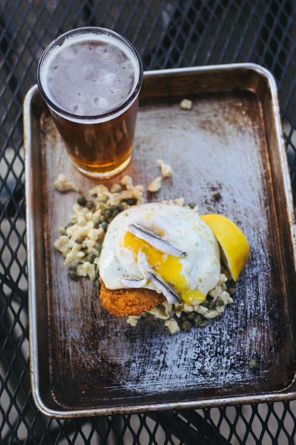 Schnitzel Holstein (Breaded Veal Cutlets with Fried Egg, Anchovies, and Lemon–Caper Sauce) will be one of the several Schnitzel dishes featured at The Second Line's "Oktoberfest" pop-up running September 1 - October 3, 2023.