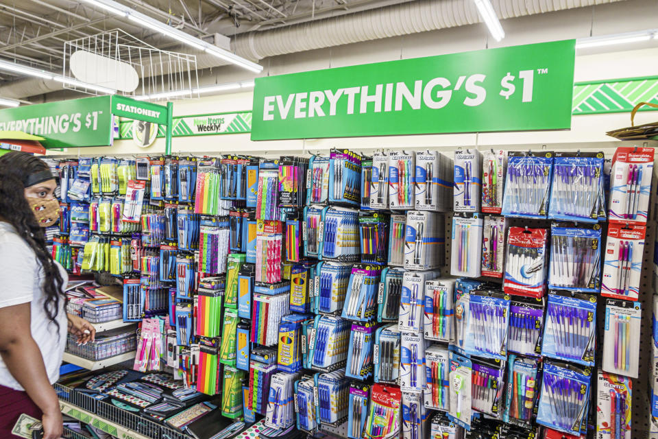 Orlando, Fla. – Dollar Tree, woman shopping for back-to-school supplies while wearing face mask. (Photo by: Jeffrey Greenberg/Education Images/Universal Images Group via Getty)