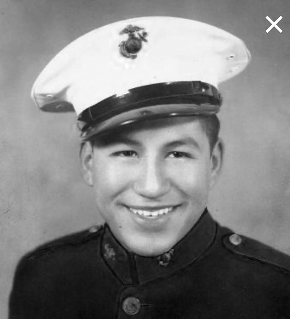 This photo provided by Russell Contreras shows U.S. Marine Pfc. Ciprian Contreras, of Houston, in a World War II-era photo before being injured three times in the Pacific theater. In an essay, Associated Press writer Russell Contreras says the July Fourth holiday as a Mexican American has always troubled him because of his family's history in the U.S. But remembering his Uncle Ciprian Contreras' heroics as a U.S. Marine at Iwo Jima in 1945, makes him look at America's Independence Day differently. (Courtesy of Russell Contreras via AP)