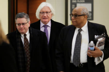 Tom Mesereau (C), lawyer for actor and comedian Bill Cosby, arrives for the tenth day of Cosby's retrial for his sexual assault case at the Montgomery County Courthouse in Norristown, Pennsylvania on April 20, 2018.Dominick Reuter/Pool via REUTERS