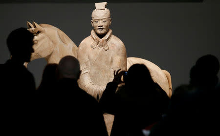 A Terracotta Warrior which guarded the tomb of China’s First Emperor, Qin Shi Huang, on loan from China is displayed in The World Museum, Liverpool, Britain February 6, 2017.REUTERS/Andrew Yates