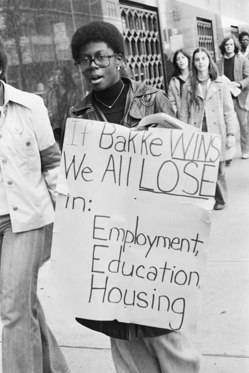 Protesters march around the Detroit federal building during Supreme Court deliberations on the Allan Bakke case. Bakke claimed that he was not admitted to University of California Medical School due to affirmative action.