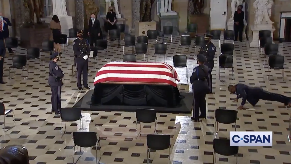 Ruth Bader Ginsburg's trainer, Army reservist Bryant Johnson, does a set of pushups while the former justice's body lay in state. (Photo: Twitter)