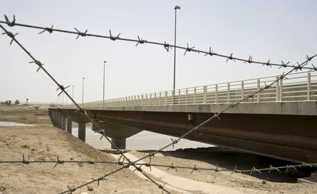 A view of a bridge to Afghanistan across Panj river in Panji Poyon border outpost, south of Dushanbe, Tajikistan, May 31, 2008. REUTERS/Shamil Zhumatov/File Photo