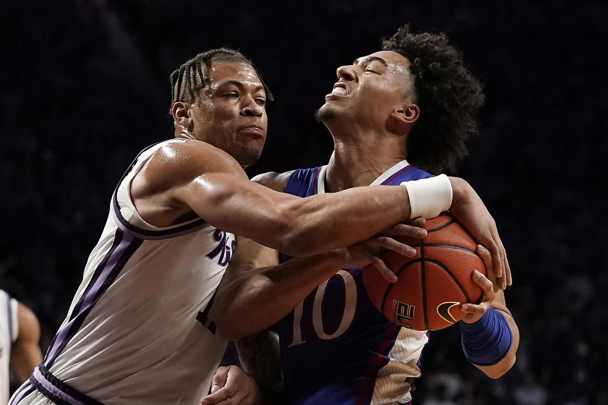 Keyontae Johnson, left, and Jalen Wilson put on a show Tuesday. (AP/Charlie Riedel)