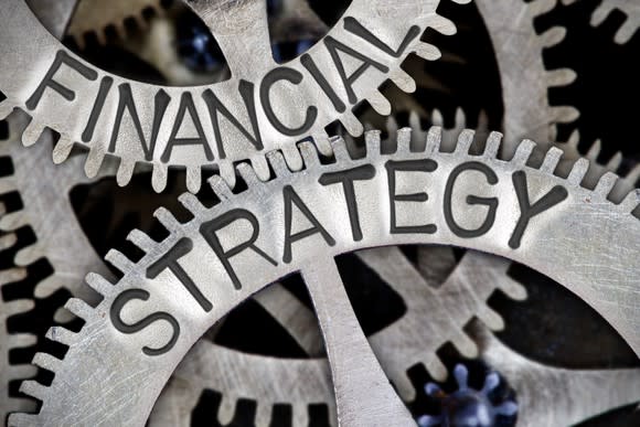 Silver gears up close, with the words financial strategy stamped on them