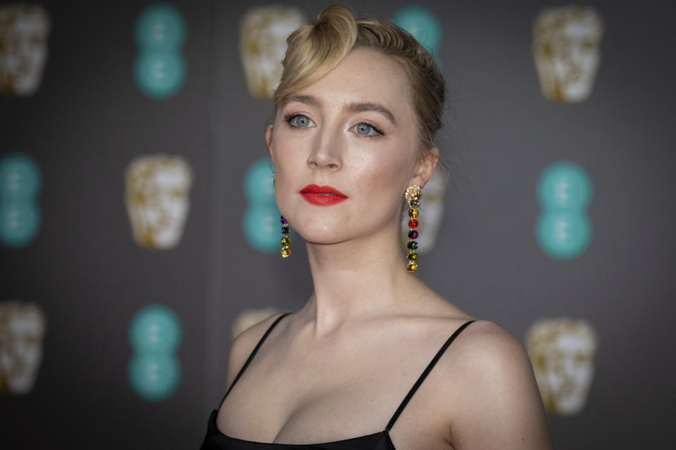 FILE - Saoirse Ronan arrives at the Bafta Film Awards, in central London, Feb. 2 2020. Ronan turns 27 on April 12. (Photo by Vianney Le Caer/Invision/AP, File)