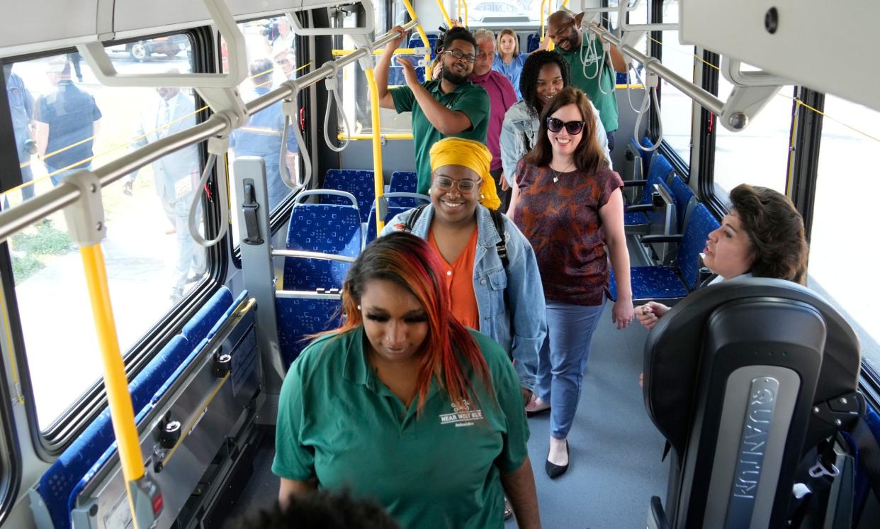 People check out the new battery powered CONNECT 1 electric bus during the ribbon cutting ceremony marking the start of the $55 million nine-mile CONNECT 1 East-West Bus Rapid Transit line, held at the intersection of Wisconsin Avenue and 27th Street, the heart of the East-West BRT in Milwaukee on Monday, June 5, 2023. The first BRT route in the county will stretch from Milwaukee's downtown to the Milwaukee Regional Medical Center in Wauwatosa along Wisconsin Avenue and Bluemound Roadwill let. Passengers will ride for free through September 30.