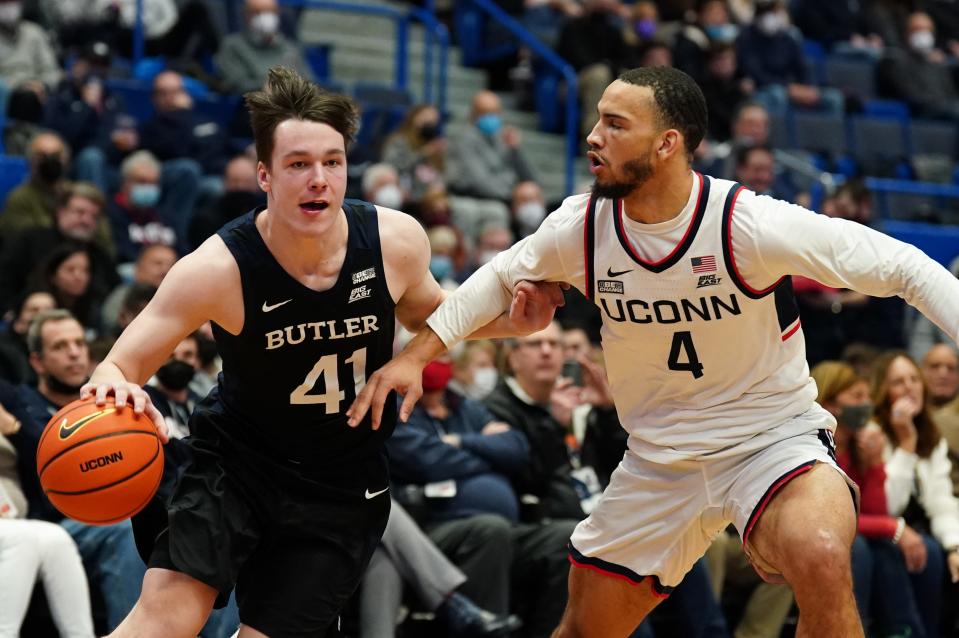 Jan 18, 2022; Hartford, Connecticut, USA; Butler Bulldogs guard Simas Lukosius (41) drives the ball against Connecticut Huskies guard Tyrese Martin (4) in the second half at XL Center.