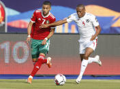 Morocco's Hakim Ziyach, left, and Namibia's Riaan Hanamub fight for the ball during the African Cup of Nations group D soccer match between Morocco and Namibia in Al Salam Stadium in Cairo, Egypt, Sunday, June 23, 2019. (AP Photo/Ariel Schalit)