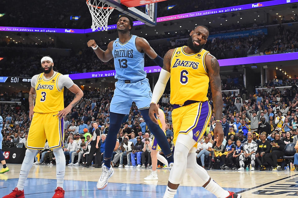 MEMPHIS, TENNESSEE - APRIL 26: Jaren Jackson Jr. #13 of the Memphis Grizzlies reacts during the second half against Anthony Davis #3 of the Los Angeles Lakers and LeBron James #6 of the Los Angeles Lakers during Game Five of the Western Conference First Round Playoffs at FedExForum on April 26, 2023 in Memphis, Tennessee. NOTE TO USER: User expressly acknowledges and agrees that, by downloading and or using this photograph, User is consenting to the terms and conditions of the Getty Images License Agreement. (Photo by Justin Ford/Getty Images)