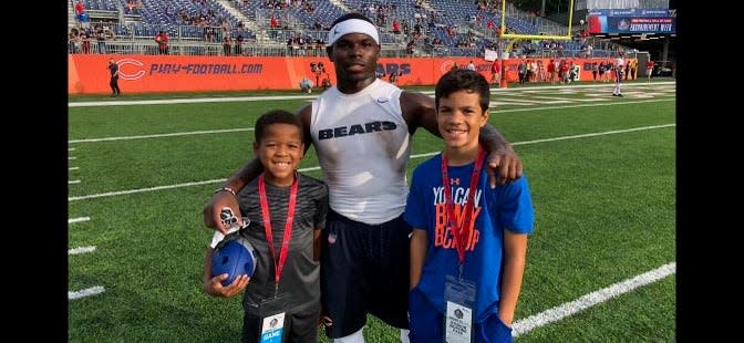 Tarik Cohen with Tony Dungy's sons, Jason, left, and Justin, at the 2018 Hall of Fame Game.
