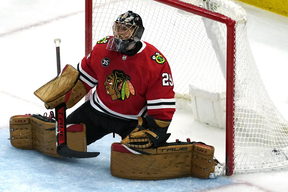 Chicago Blackhawks goaltender Marc-Andre Fleury reacts after Winnipeg Jets left wing Nikolaj Ehlers scored a goal during the first period of an NHL hockey game in Chicago, Sunday, March 20, 2022. (AP Photo/Nam Y. Huh)