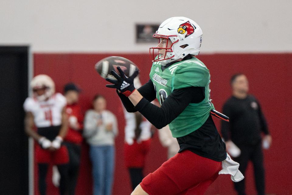 Louisville football's Sam Young is primarily a quarterback, but he worked out at receiver during the team's spring practices.