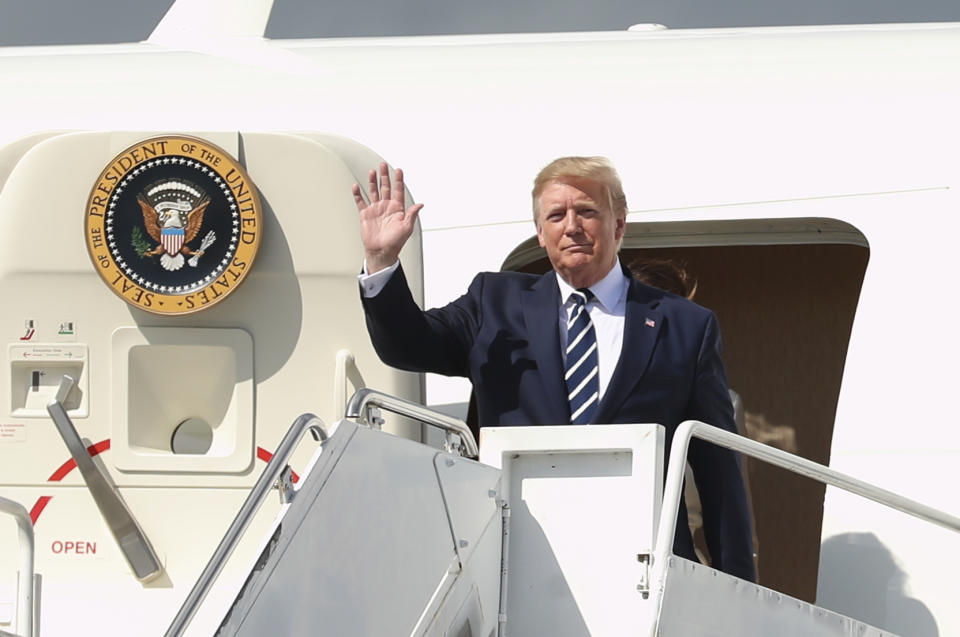 US President Donald Trump and first lady Melania arrives afetr landing at Shannon Airport, Ireland, on the first day of the president's visit to Ireland, Wednesday June 5, 2019. (Liam McBurney/PA via AP)