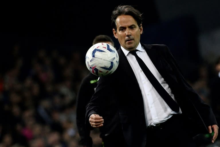 Simone Inzaghi can win his first Serie A title as a coach if <a class="link " href="https://sports.yahoo.com/soccer/teams/inter/" data-i13n="sec:content-canvas;subsec:anchor_text;elm:context_link" data-ylk="slk:Inter Milan;sec:content-canvas;subsec:anchor_text;elm:context_link;itc:0">Inter Milan</a> beat <a class="link " href="https://sports.yahoo.com/soccer/teams/milan/" data-i13n="sec:content-canvas;subsec:anchor_text;elm:context_link" data-ylk="slk:AC Milan;sec:content-canvas;subsec:anchor_text;elm:context_link;itc:0">AC Milan</a> in the Milan derby (Filippo MONTEFORTE)