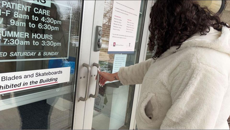 A student enters the Ball State Student Health Center. The number of yearly visits to the health center have decreased by thousands since 2018.