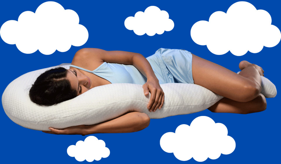 someone sleeping with the contour swan body pillow on a cloudy background