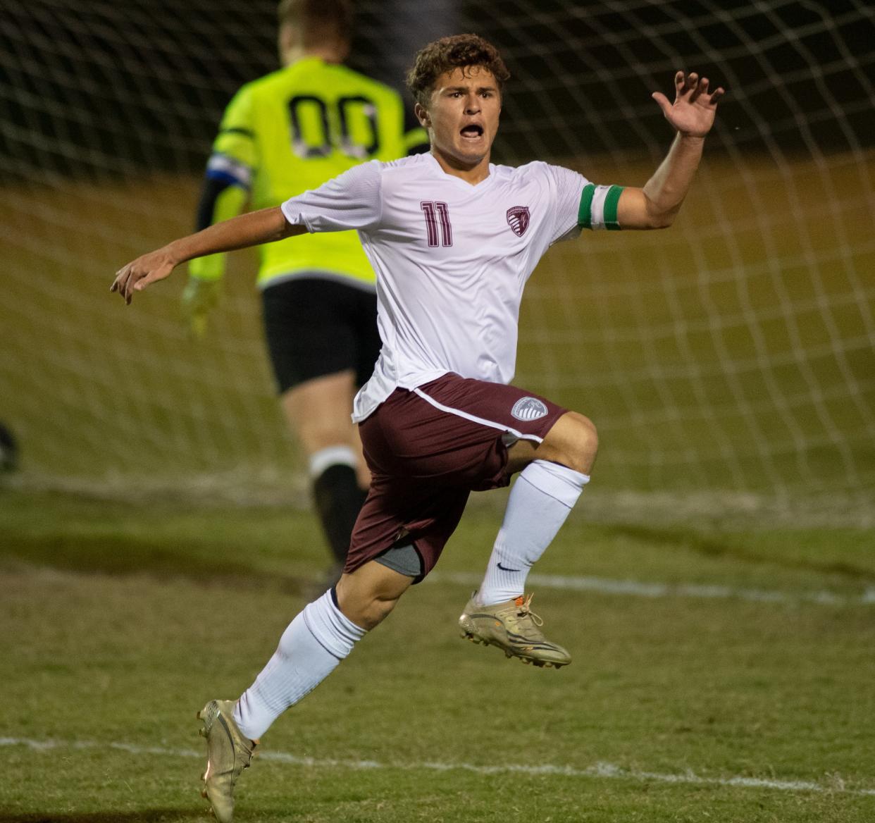 Henderson's Ashton Todd (11) celebrates his goal as the Henderson County Colonels take on the Caldwell County Tigers in the 2nd Region Soccer Tournament finals at the Stadium of Champions in Hopkinsville, Ky., Thursday evening, Oct. 14, 2021.