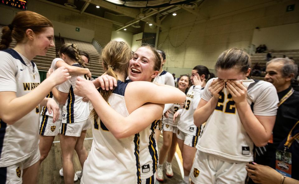 Our Lady of Lourdes players shed tears of joy after defeating Liverpool 69-54 in the New York State girls Class AAA basketball championship game at Hudson Valley Community College in Troy March 17, 2024.