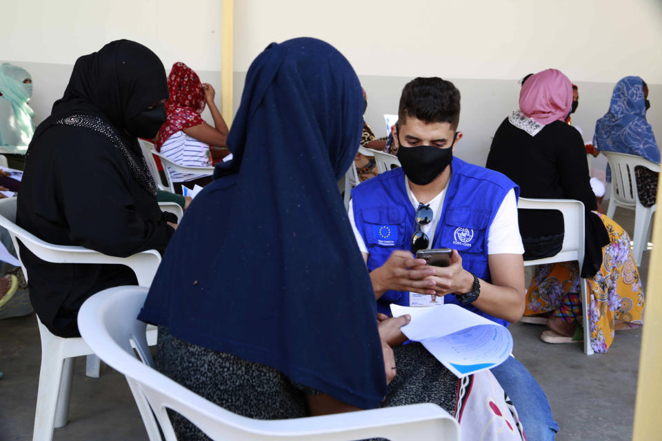 A vaccination campaign against the coronavirus is underway at a Tripoli shelter for migrants, organized jointly by the Libyan center for disease control and the International Organization for Migration. in Tripoli, Libya, Wednesday Oct. 6, 2021. (AP Photo/Yousef Murad)