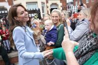 <p>She posed for photos with the well-wishers.</p>