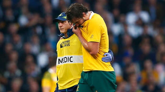 Wallabies lock Kane Douglas leaves the field early in the game with a knee injury.