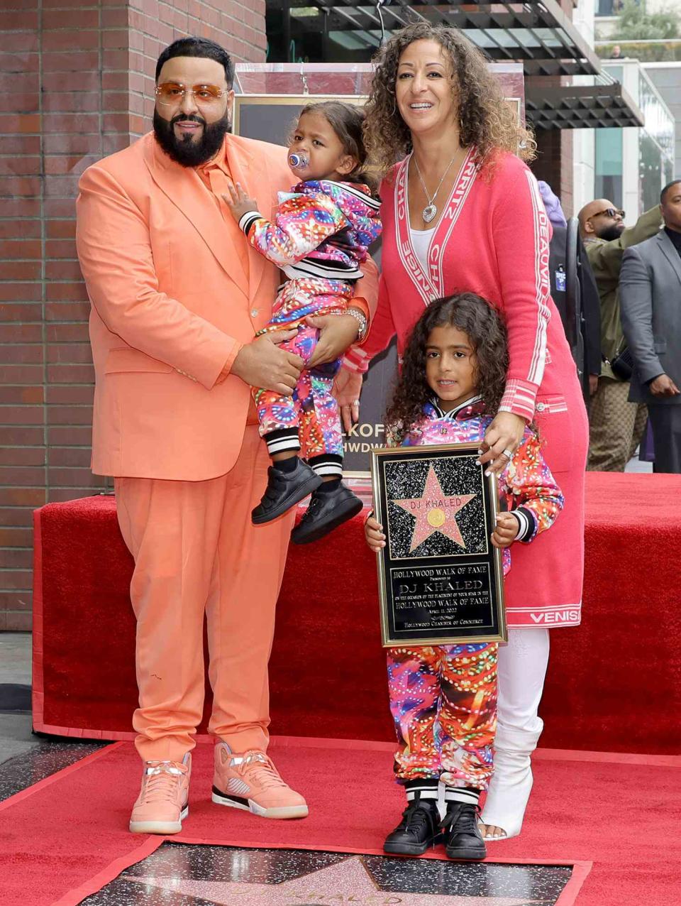 DJ Khaled, Aalam Khaled, Nicole Tuck and Asahd Tuck Khaled attend the Hollywood Walk of Fame Star Ceremony for DJ Khaled on April 11, 2022 in Hollywood, California