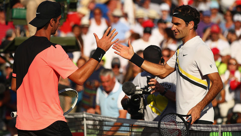 Thanasi Kokkinakis and Roger Federer, pictured here at the Miami Open in 2018. 